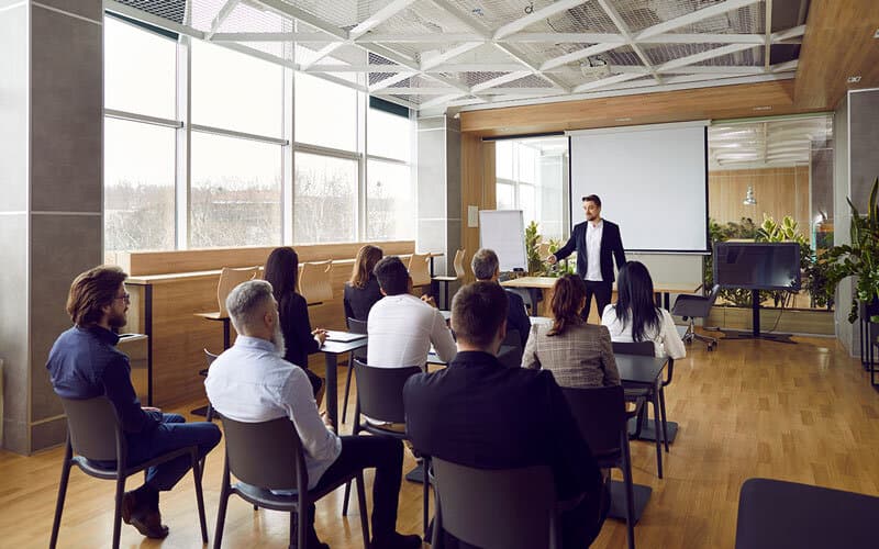 Privacy professional leading a team through a privacy and security coaching session