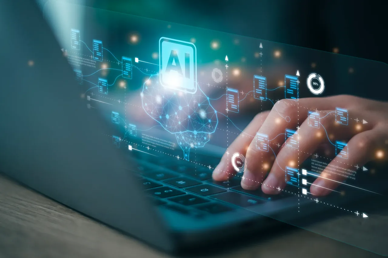 A person working on a laptop with an AI data hologram overlay