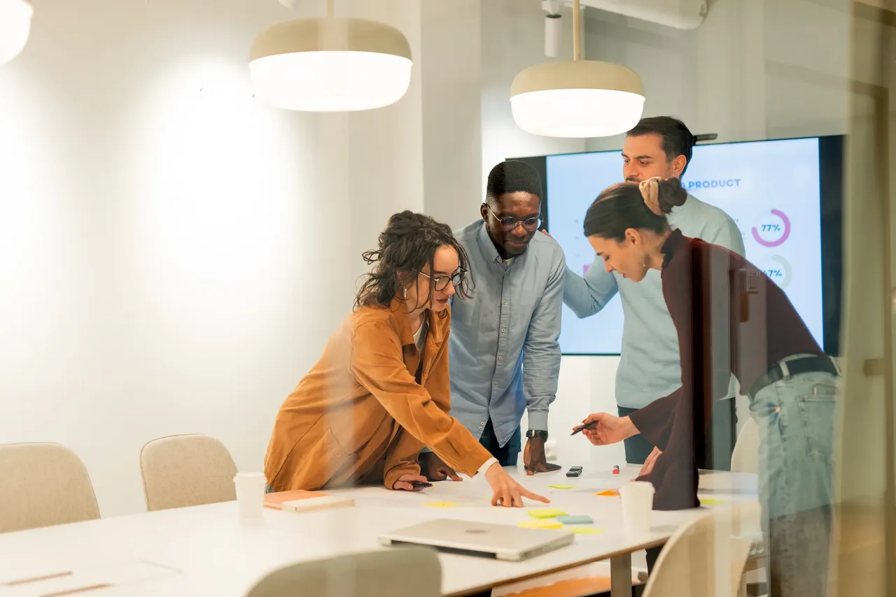 A team of security professionals collaborating in a meeting room