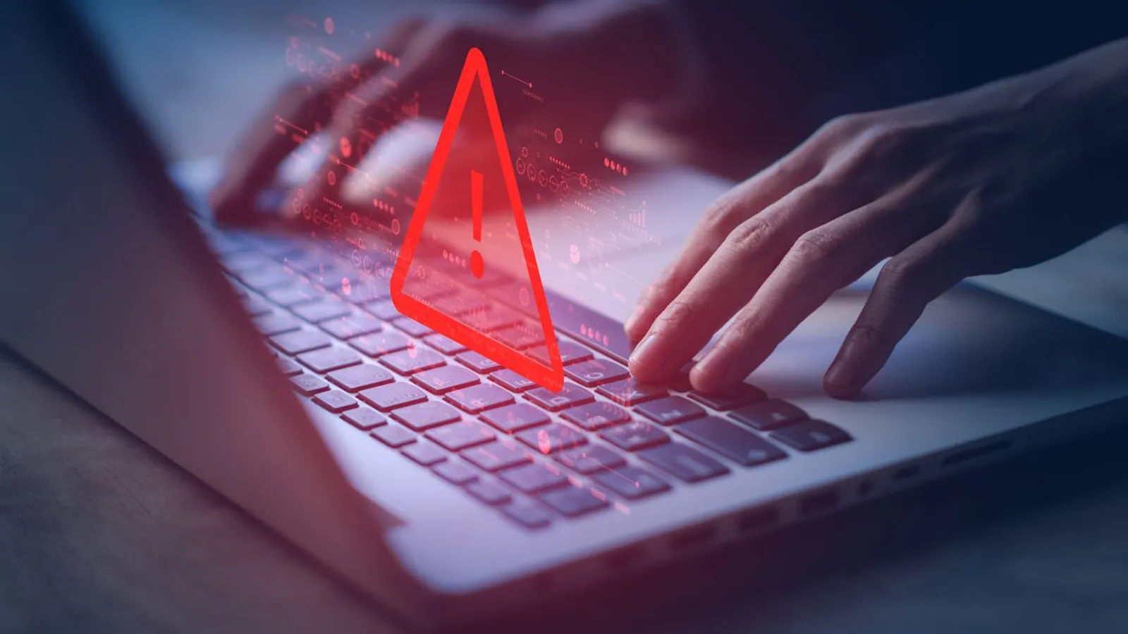 cybersecurity-breach-warning-laptop-hologram