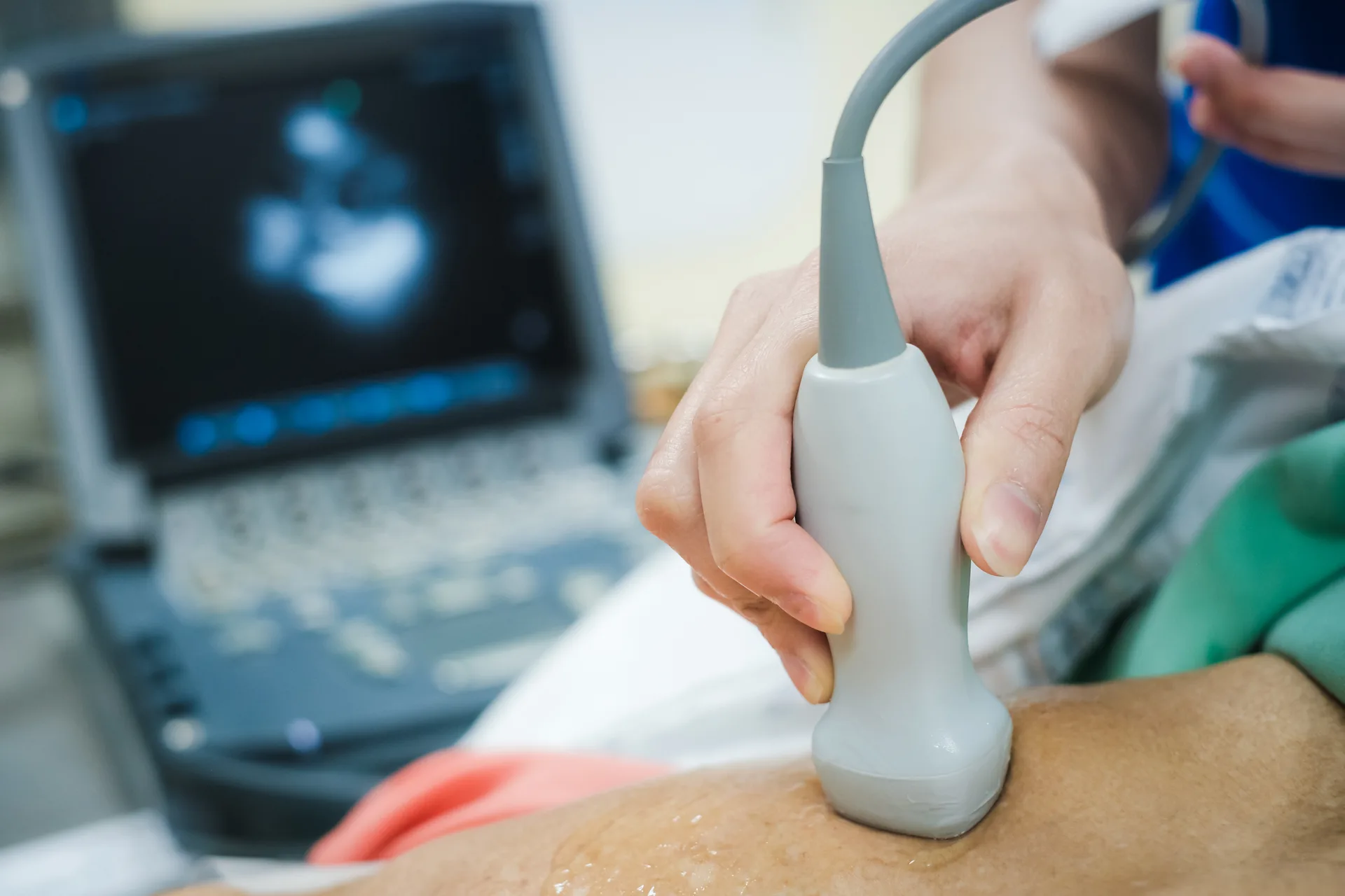 Doctor is examining heart's patient by echocardiogram