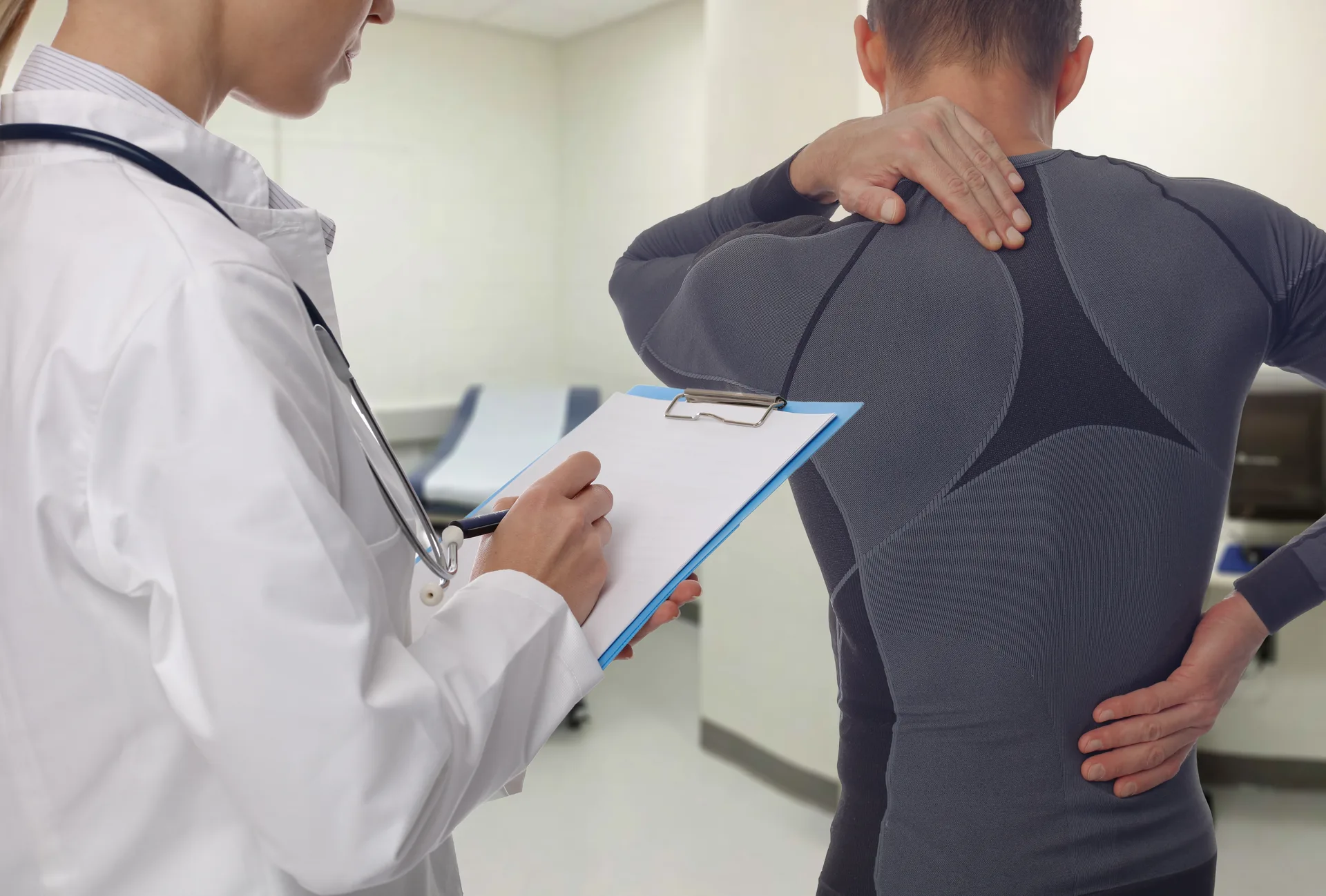 Chiropractic, osteopathy, Physiotherapy, Sport injury rehabilitation. Alternative medicine, pain relief concept. Man patient suffering from back pain during medical exam